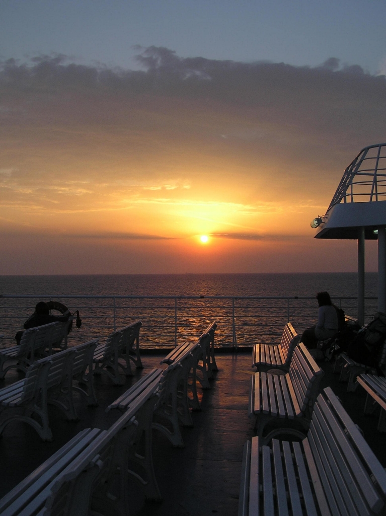 Zonsondergang vanaf een veerboot